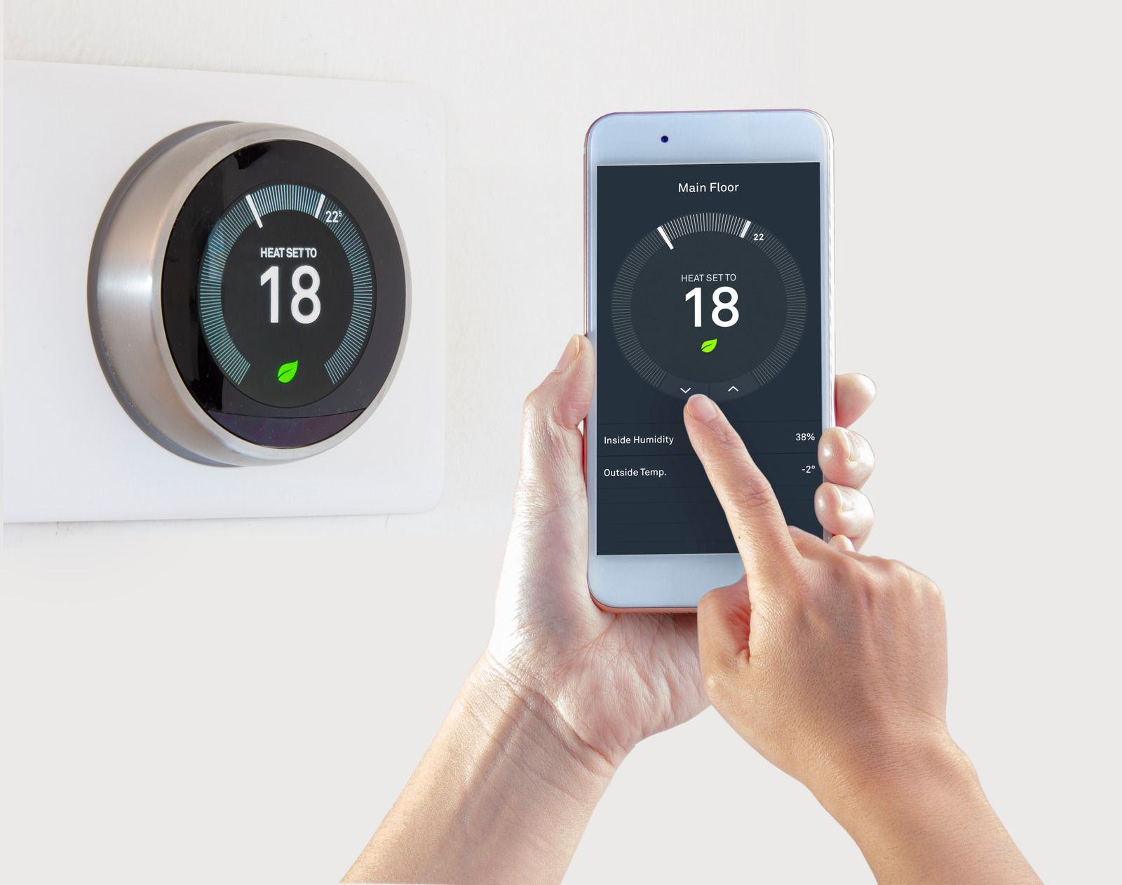 Image of a smart thermostat displaying temperature settings.