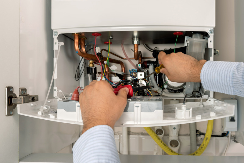 Techno Gas HVAC Specialist repairing Boiler in Burnaby